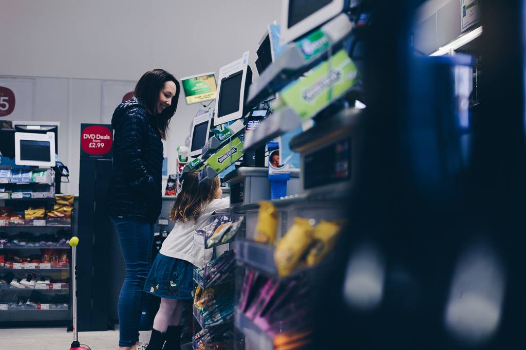 family in supermarket photography