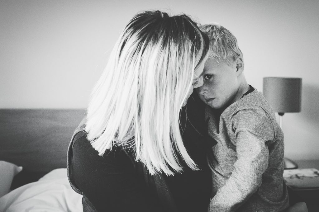 Family Photographer Newcastle little boy in bad mood