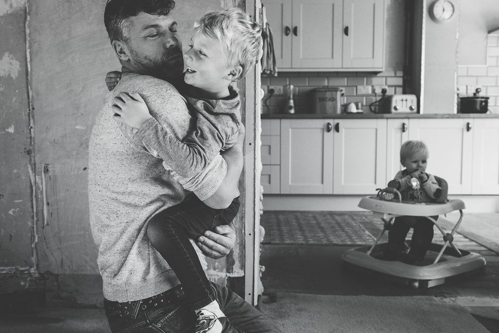 Family Photographer Newcastle dad plays with child