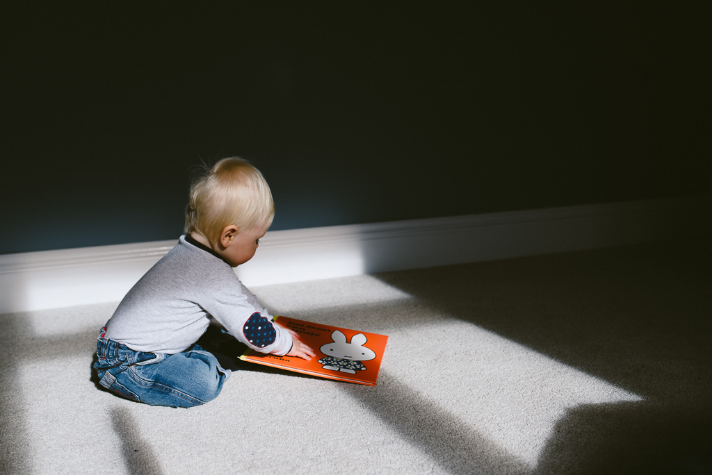 Baby in window light