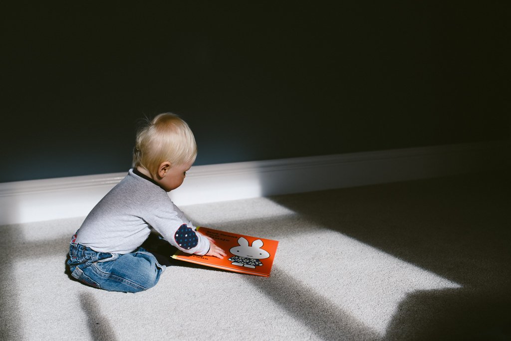 Baby in window light