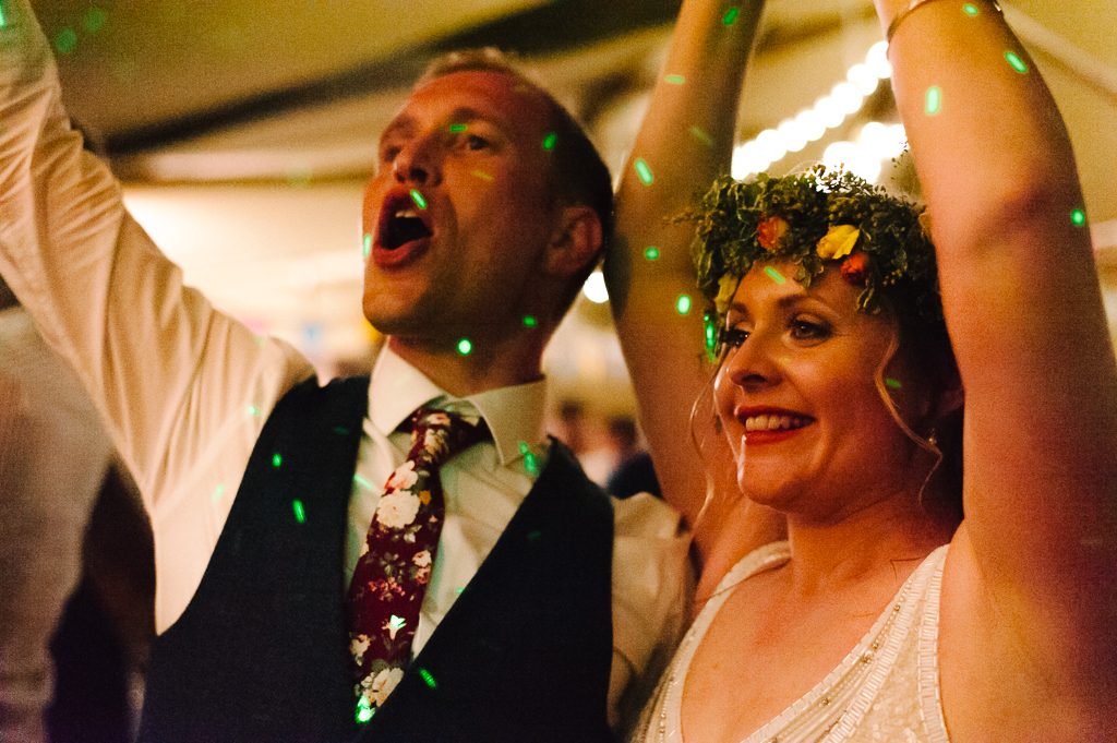 partying bride and groom