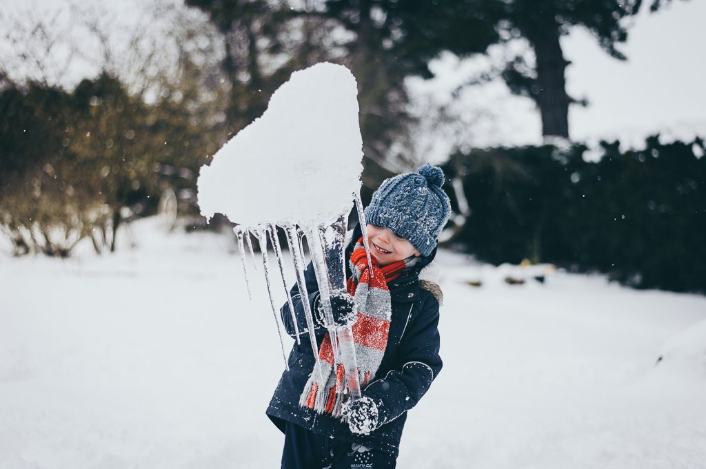 Boy with giant icicle