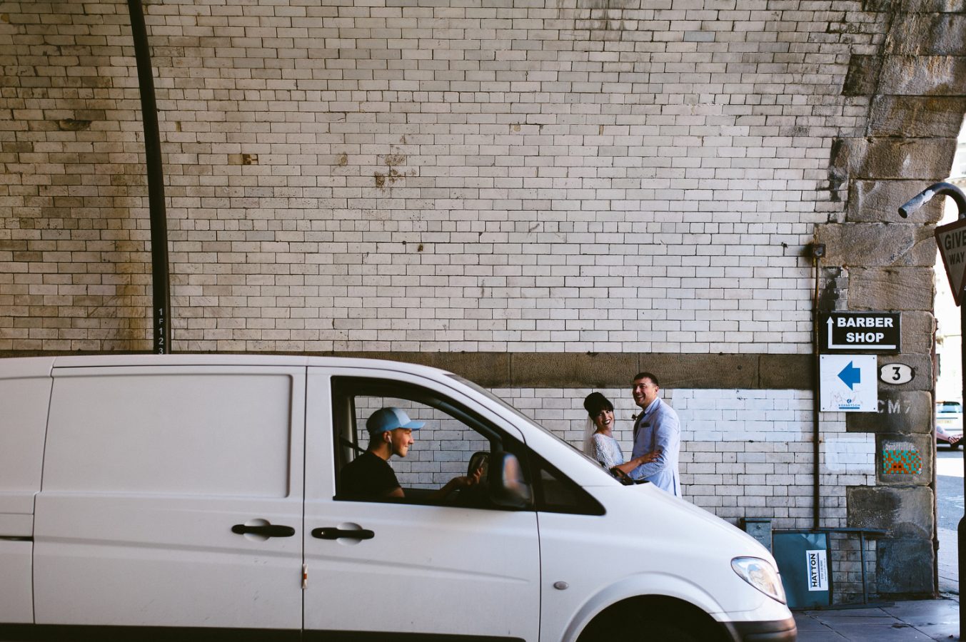 wedding couple in tunnel with van