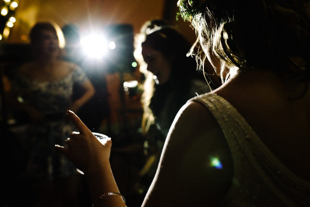 bride dancing in spotlight