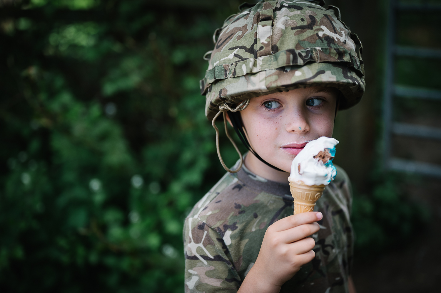 VE Day LR-7 little boy dressed up as soldier eating an icecream