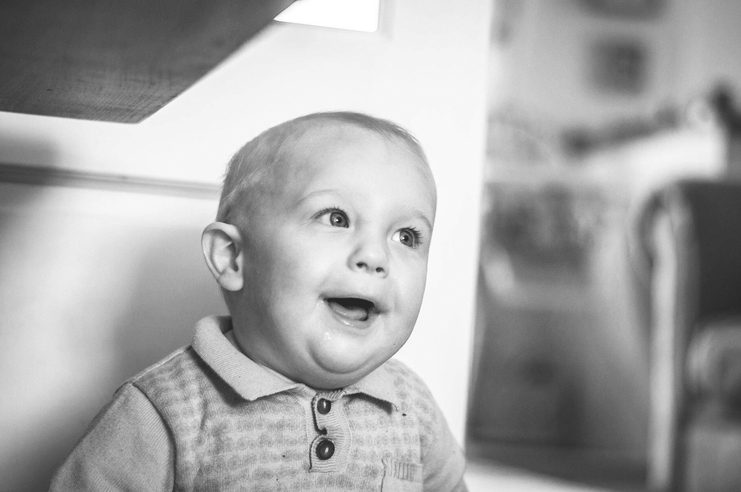 boy sitting by door