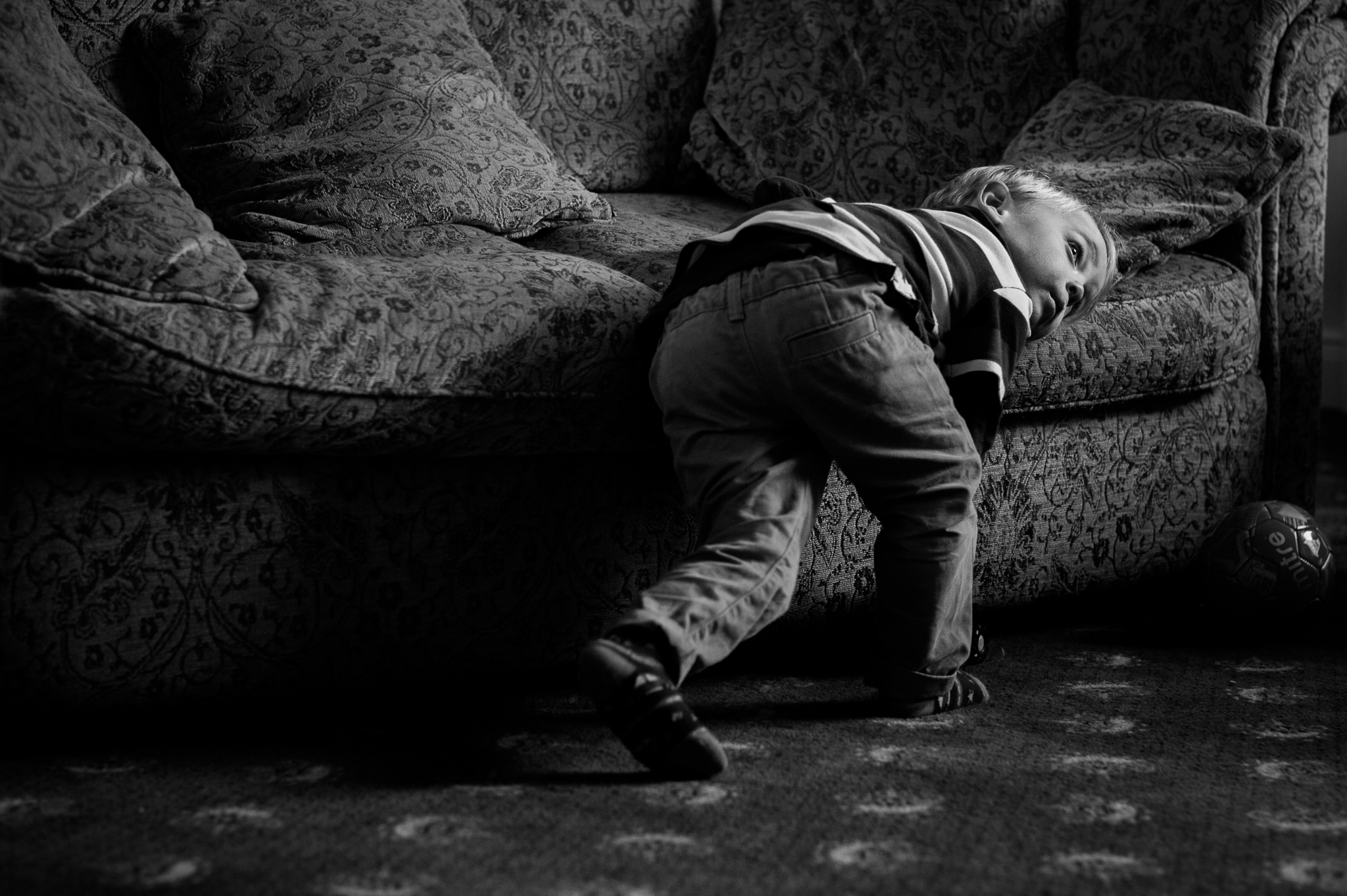 boy resting on couch