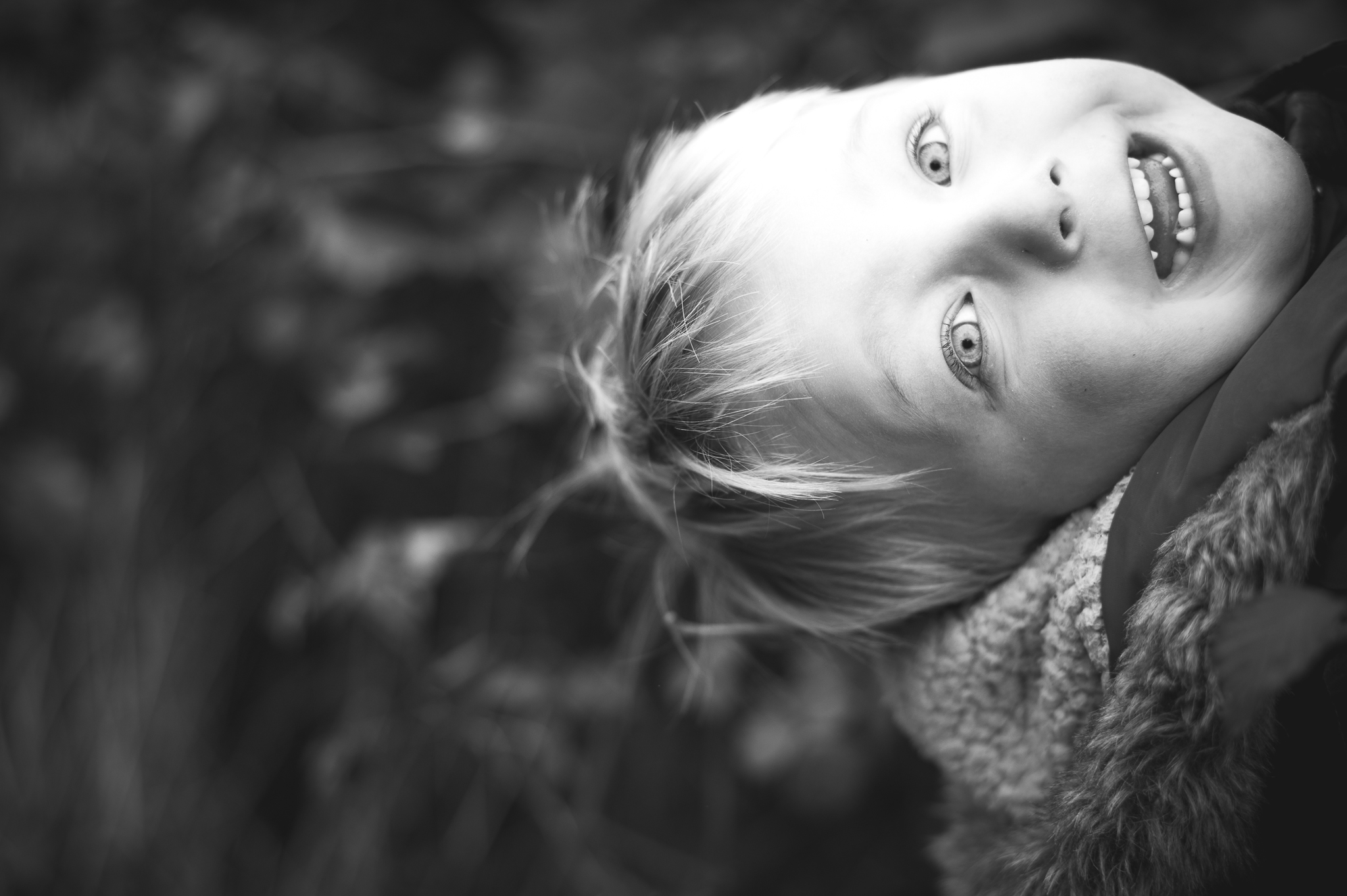 boy climbing up tree