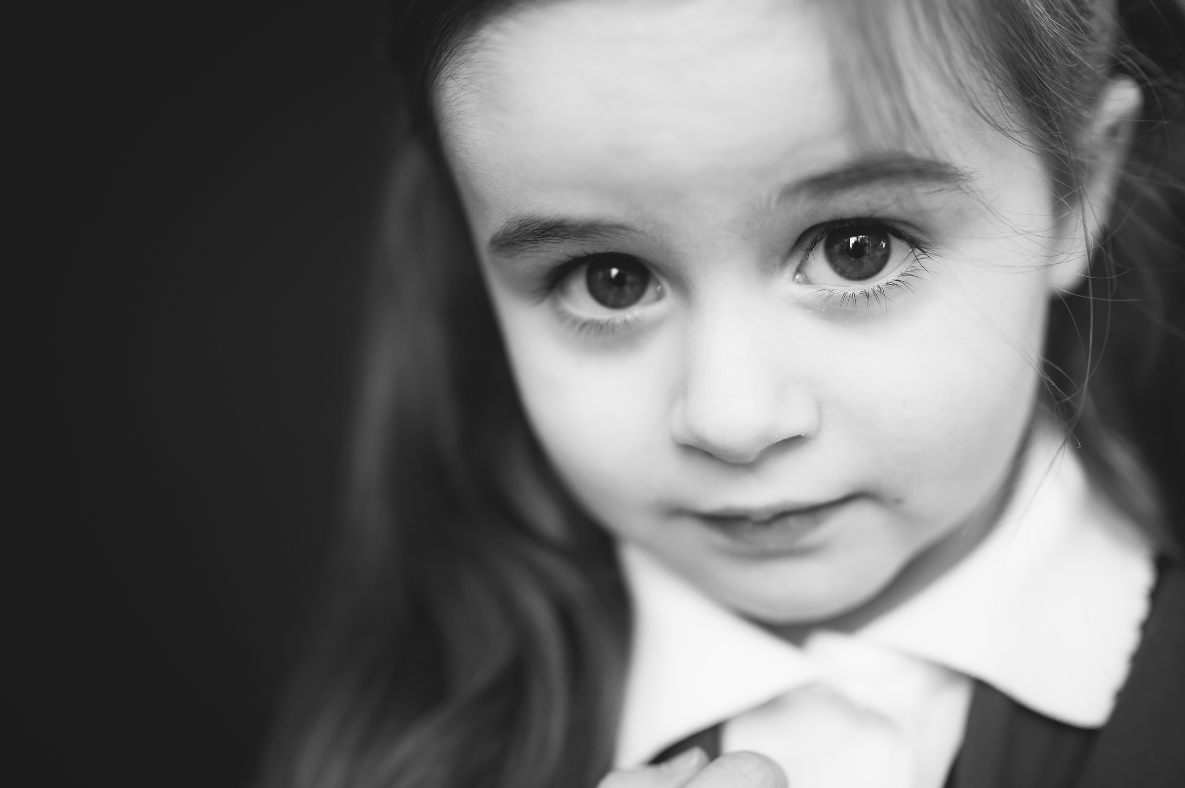 Fine art portrait of girl looking up inquisitively