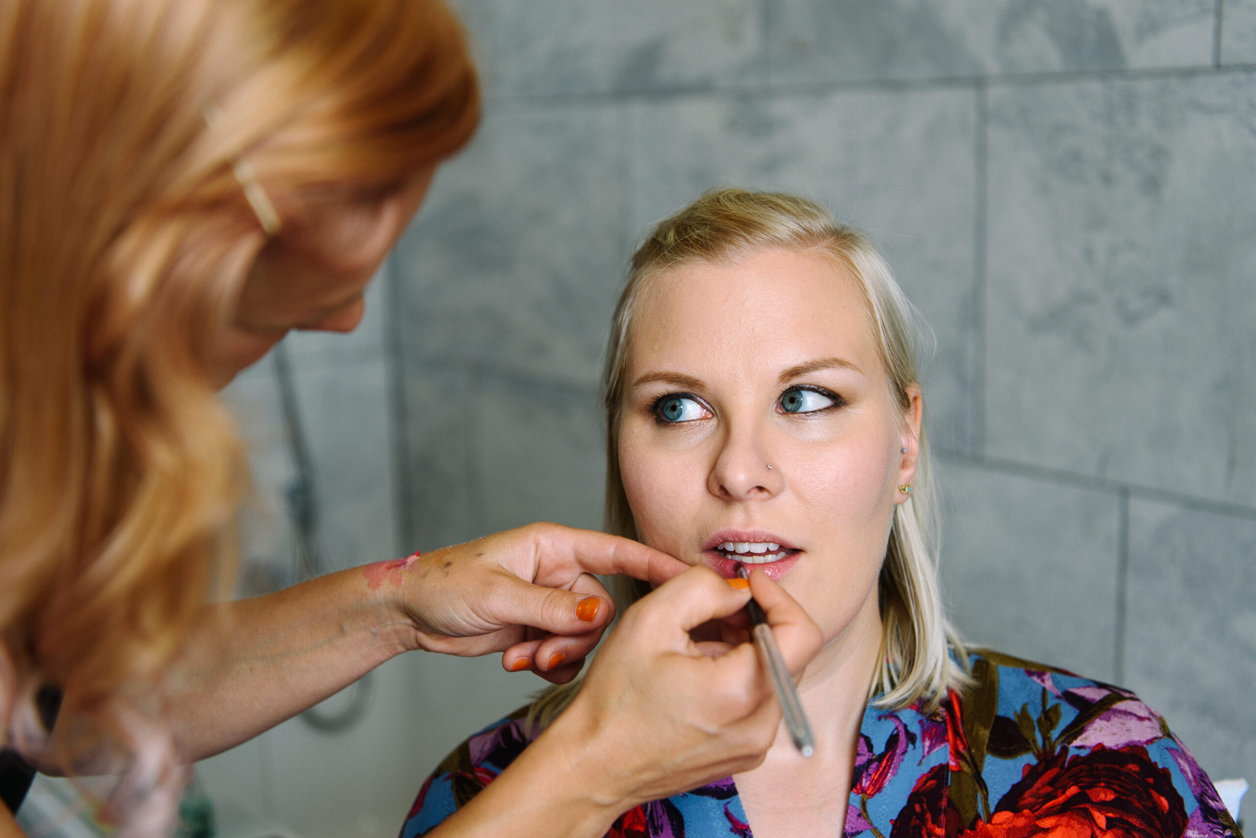 Quirky Seaside Wedding - bridge doing lipstick