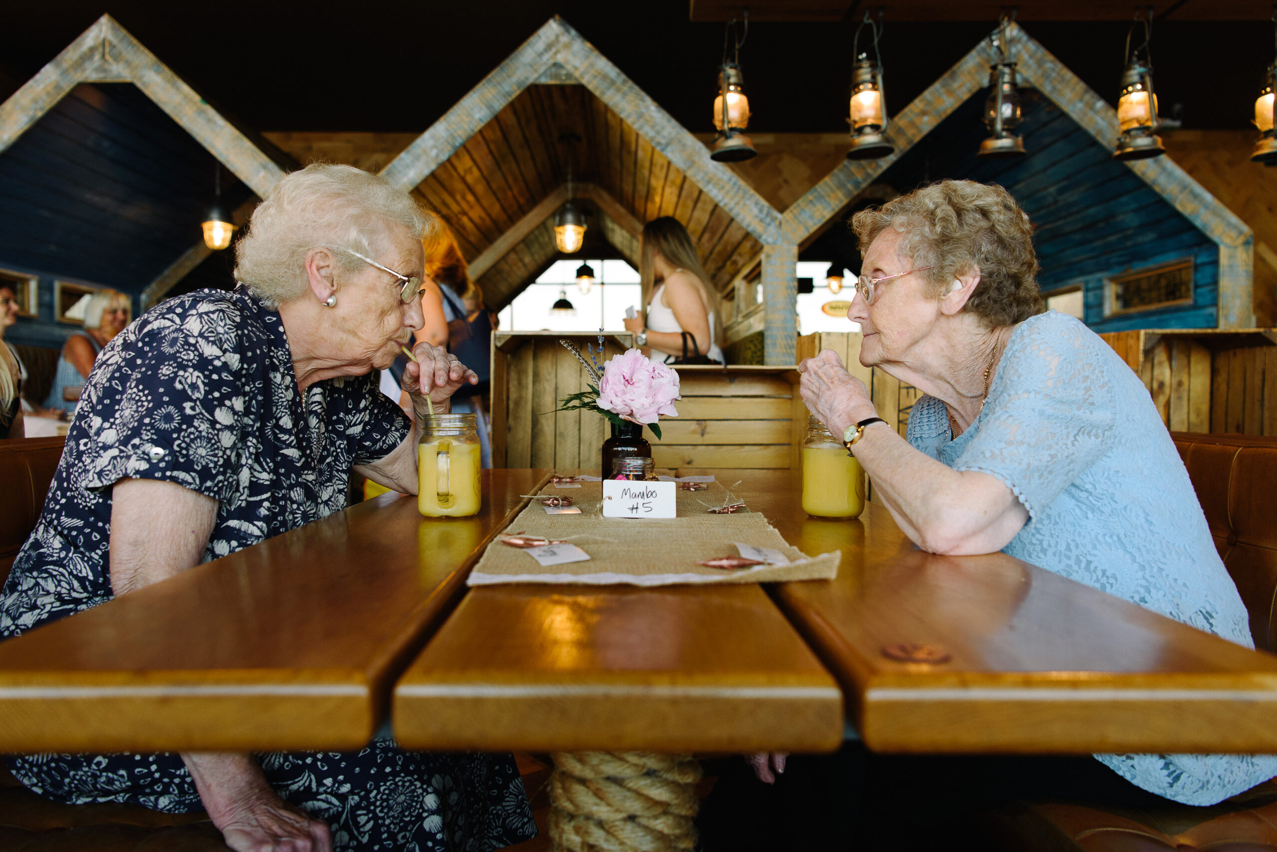 old ladies drinking orange at the view