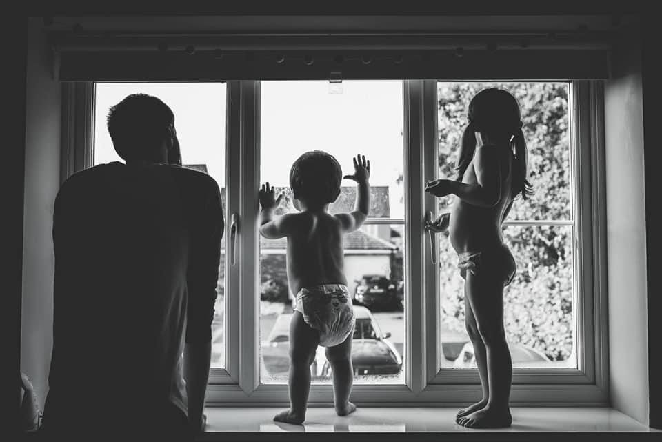 Kids looking out of window