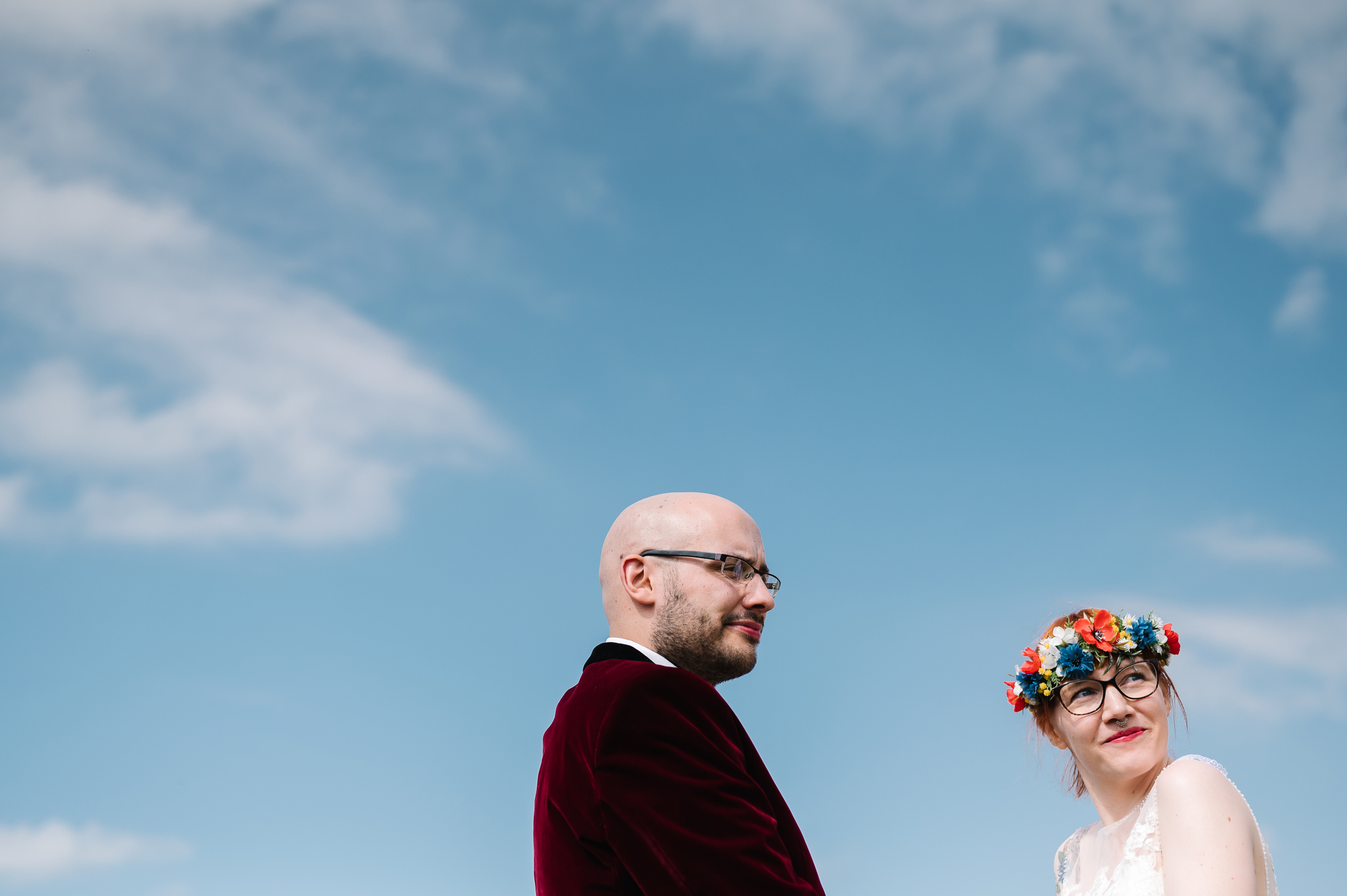 festival wedding with blue skies