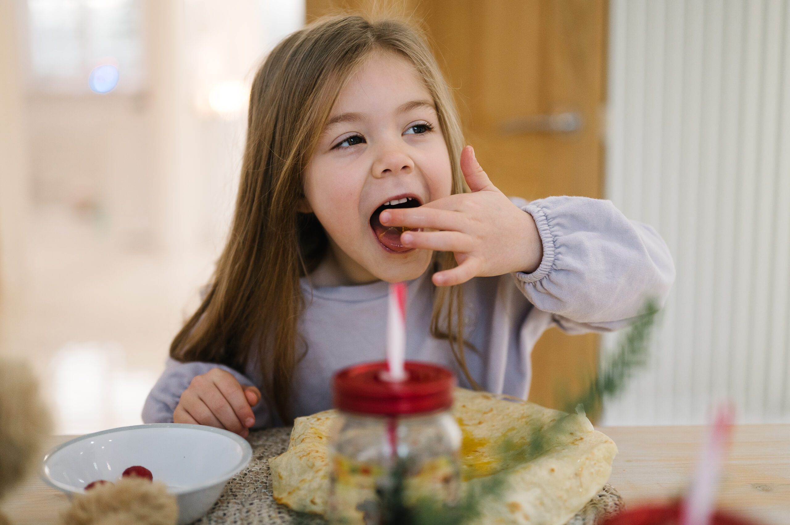 Girl Eating pancakes